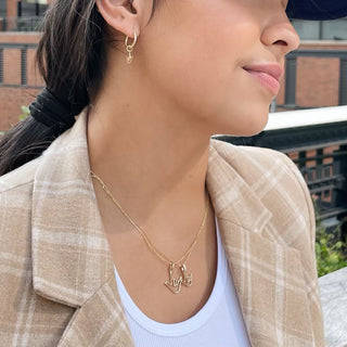 Love Sign™ Huggy Earrings